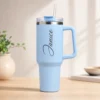Custom name light blue sip tumbler with handle, straw and personalized design